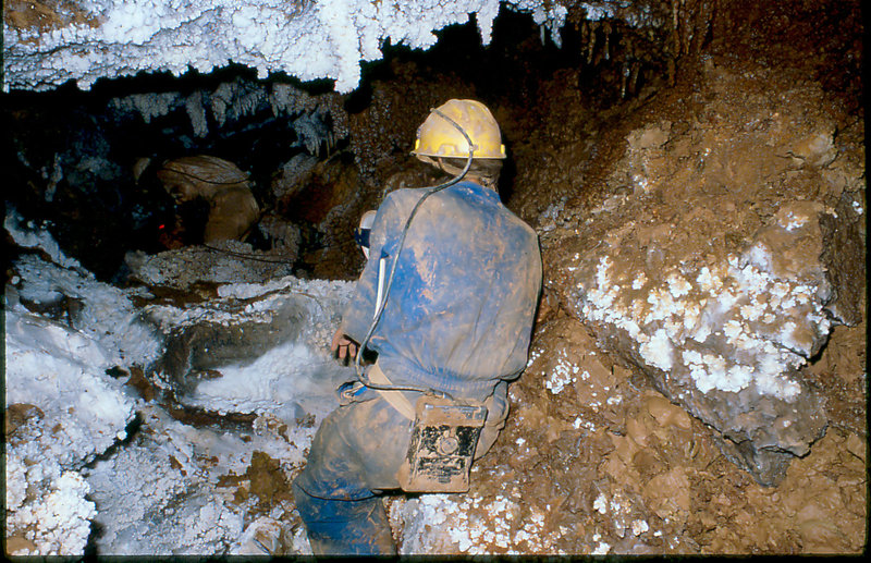 surveying in stream passage under Krakatoa Cango 3 Easter 19