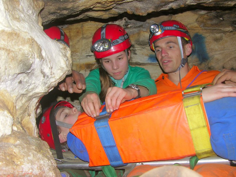 Marcus Collins the Safety Officer watchs carefully as Jessica packages Amy into a stretcher in a confined space 5267